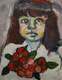 Portrait of young girl with flower